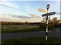 Signpost at junction of Washbrook Lane and Hawkes Mill Lane, Hawkes End in CV5 9FH