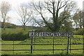 Village sign entering Arthingworth in Arthingworth