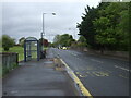 Bus stop and shelter on Ayr Road (B7038) in KA1 4PY