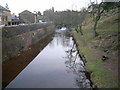 Looking upstream from bridge to railway station in YO22 5LY