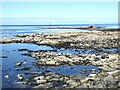 Rocky shore north of Cairnbulg Harbour in AB43 8WN