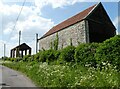 Old and new barns on East Town Lane in BA4 4NX