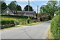 Village street past Burcombe Manor in SP2 0EW