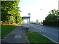 Bus stop and shelter on Macalpine Road, Dundee in DD3 8SD