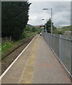 NW through Ewenny Road railway station, Maesteg in CF34 9EH
