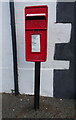 Elizabeth II postbox on Newton Cross Road, Newton in LA13 0ED