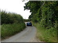 Brewery Road near junction with track to Howard's Close in NR11 8EX