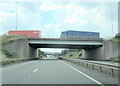A38 southbound passing under island for A5 and M6 Toll Road in WS14 0PL