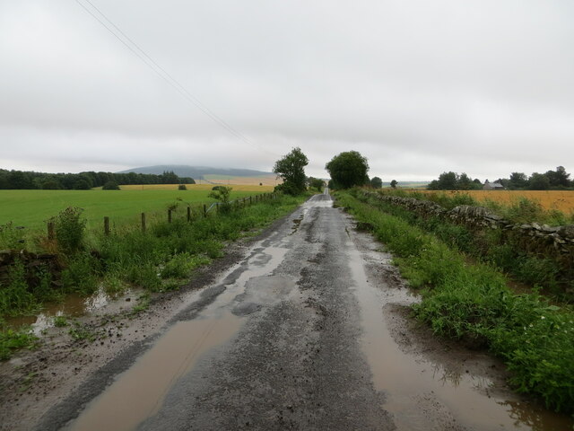 Water-logged minor road between Newton and Hatton in DD8 2JS