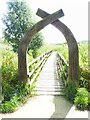 Carved arch entry to Avon Meadows in WR10 3NS