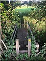 Footbridge on path connecting Old Wilmslow Road to A538 North of Mottram St. Andrew in SK10 4QX