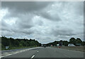The slip road exiting Membury services joining the M4 heading east in RG17 7TQ