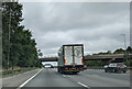 On the M40 west-bound where road crosses near Hedgerley Green in SL9 8TB
