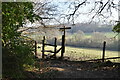 Footpath waymarker by Stile in TN6 3PE