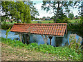 Boat House on the shore of the Fishpond, Doddington Hall estate in LN6 4RU