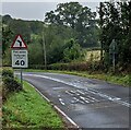 Warning sign on the approach to a bend in Usk Road, Mynydd-bach, Monmouthshire in NP16 6RW