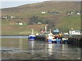 Fishing boats alongside King Edward Pier at Uig in IV51 9XX