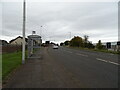 Bus stop and shelter on Old Edinburgh Road (B7001) in G71 6NU