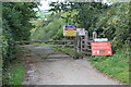 Gates on access road to Cwm Lliedi Reservoir in SA14 8BT