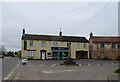 Village cross and ATZ & H Inn, North Kyme in LN4 4DG