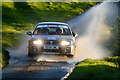 A car makes a splash in the 2021 Cambrian Rally in LL16 5LR