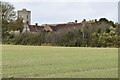 View up sloping field towards Cobham Church in DA12 3BP