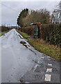 Dark green bus shelter, Whitson in Goldcliff Community