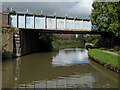 Railway bridge and canal in Nuneaton, Warwickshire in CV10 9QA