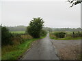 Minor road approaching Edderton Mains in IV19 1LJ