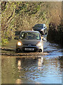 Floodwater on Maes y Bryn Road in CF14 0HY