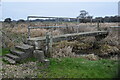 Footbridge over drainage ditch in marshland west of Burton in Christchurch