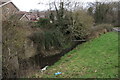 Billing Brook running through a housing estate in NN3 5AX