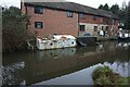 Sunken canal boat at bridge #89, Coventry canal in WS13 8SG