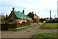 Cottages at north end of High Street, North Marston in MK18 3PL