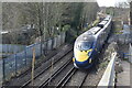 Eastbound Javelin train approaching footbridge at Denton in DA12 2PS