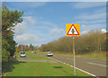 Approaching a minor crossroads on the A4244 in LL55 3DE