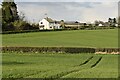 View across fields to house in Bream Road in GL15 6QY