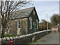 Church and bus stop beside the A494 in Llanuwchllyn Community