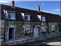 Cottages beside the B1416 at Sneaton in YO22 5HS