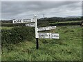 Old direction sign at the crossroads of the A356 and A3066 in DT8 3HT