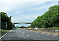 Footbridge over the A47 west approaching junction with A11 in NR4 7NB