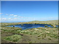 Pool of water near summit of King's Seat Hill in FK14 7PX
