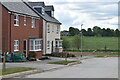 Newly built houses beside Pix Brook in SG5 4TS
