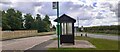 Bus stop with shelter at East Leake village name signs in LE12 6RT