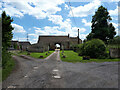Entrance to Church Farm through the barn in SN15 5ER