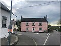 Pink house on the road junction at Egwlyswrw in SA41 3UJ