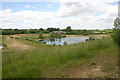 Flooded disused stone quarry south-west of Wansford in PE8 6PN