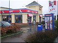KFC, Kirkcaldy (showing entrance and drive-thru lane) in KY2 6YH