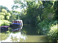 Boats moored on the Kennet & Avon canal south of Claverton in BA2 7BH