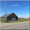 A corrugated shed at Green End Farm in CB21 5NF